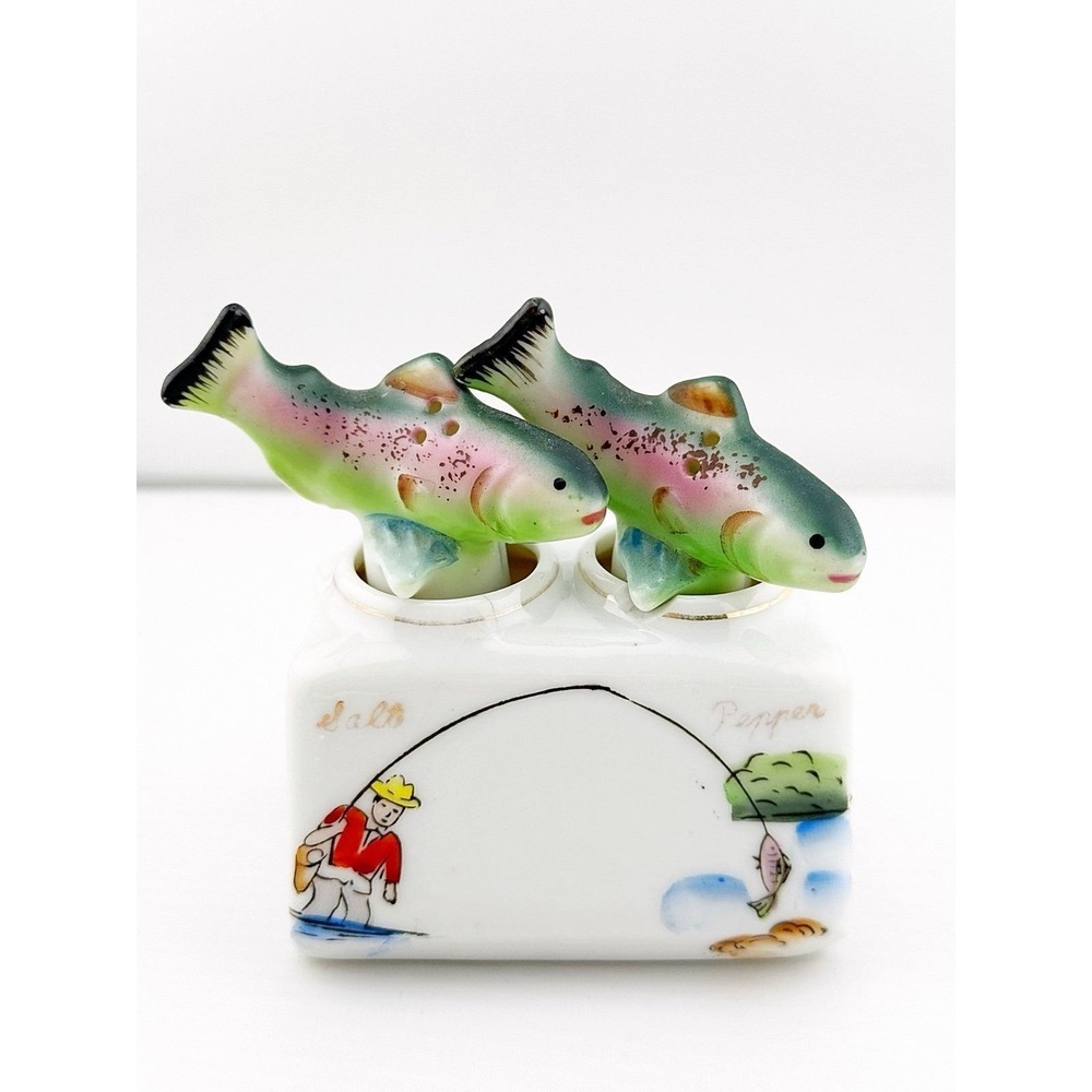 Vintage Japanese 1950's fish nodder salt & pepper shakers. Base shows fishing